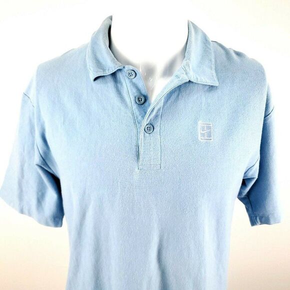 ‎Nike Small Blue Back Stripe Polo - Picture 1 of 7